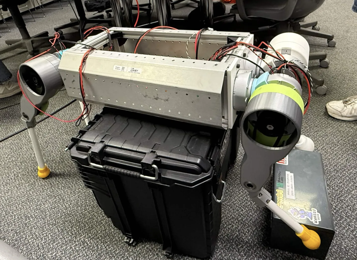 CCBR quadruped robot hardware on a lab floor
