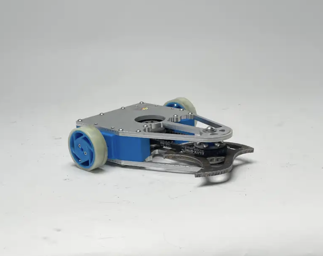 Combat Robotics 3 lb robot Tiny Tim on a white surface